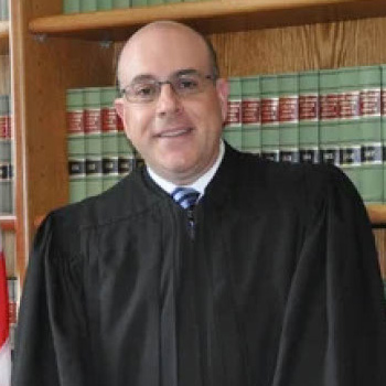 Presenter - Honorable Stuart Minkowitz